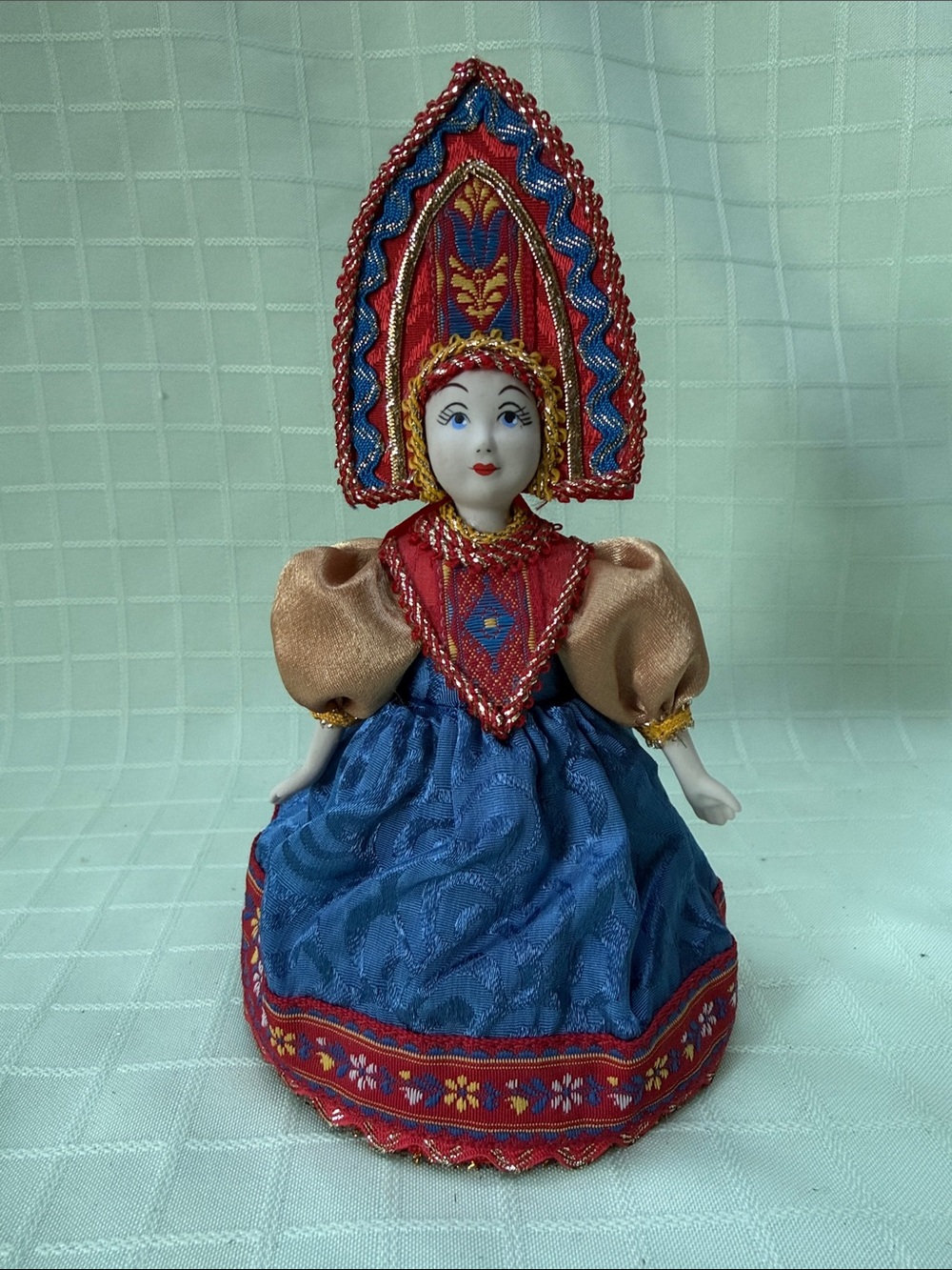 Vintage handmade and hand painted doll in folk costume